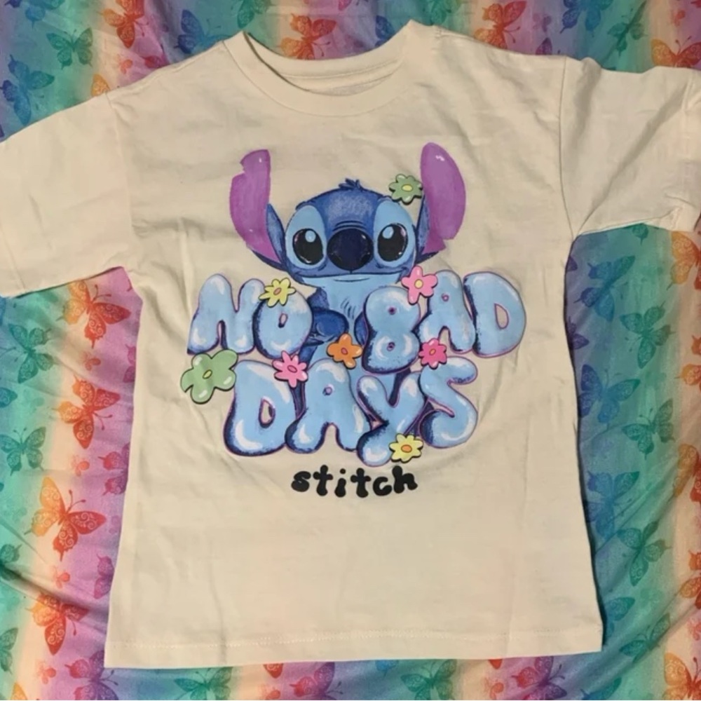 Disney Stitch Kids T-Shirt - Cream with Blue and Purple Accents. Size: XS